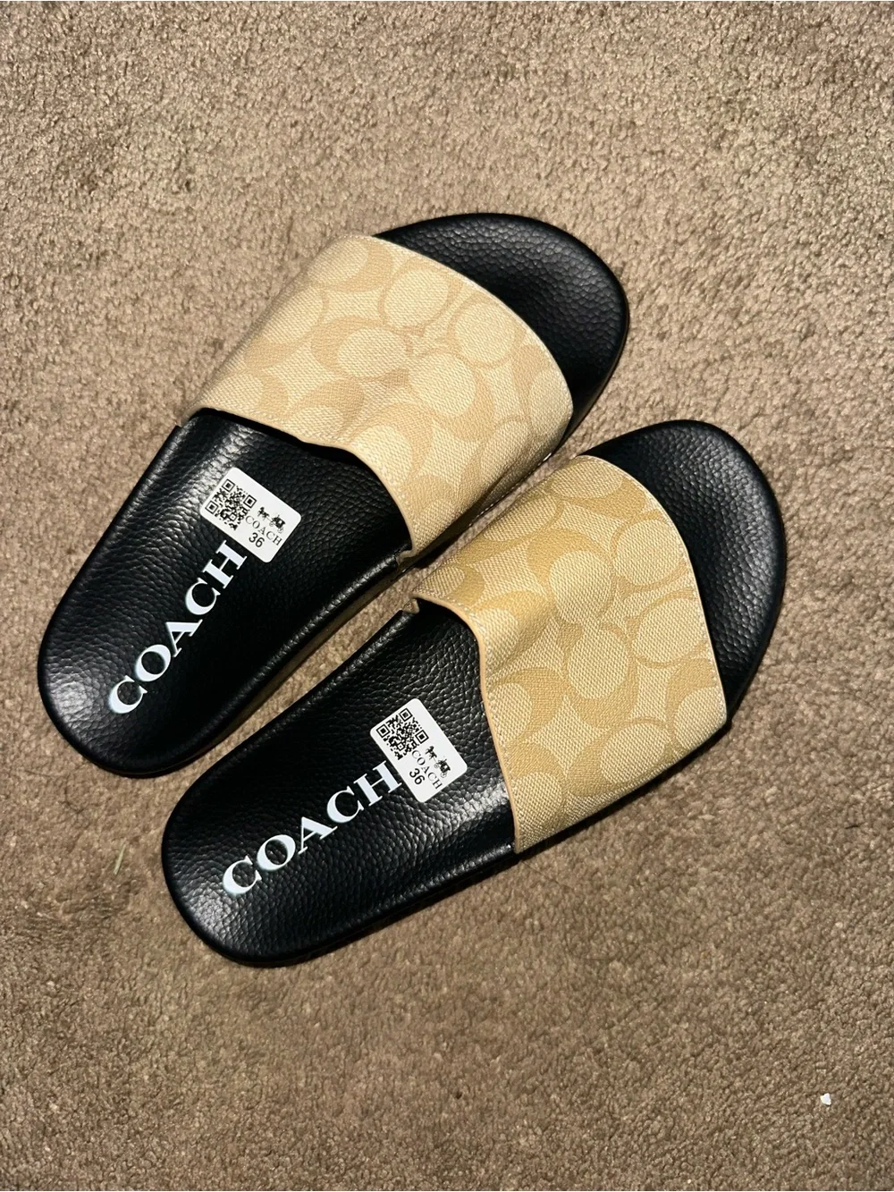 Beige coach slides